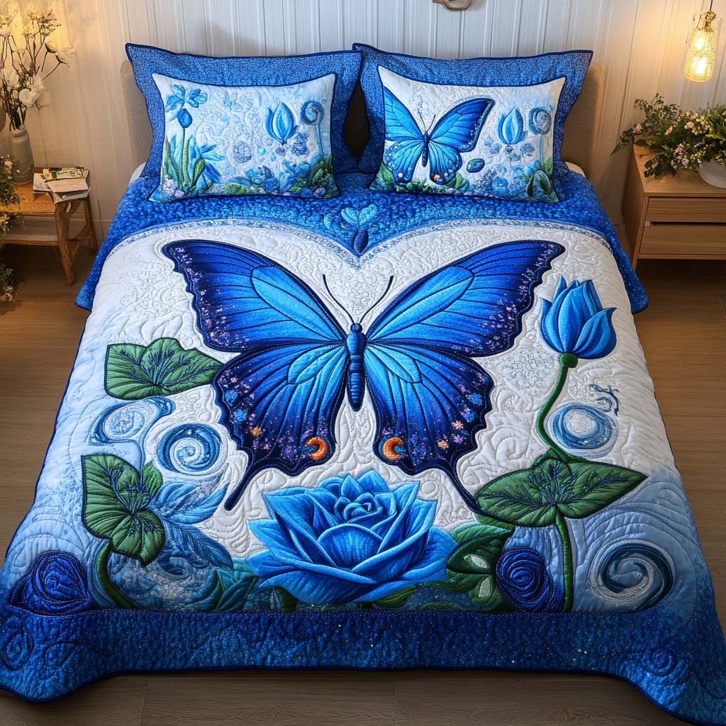 Butterfly Serenity quilted 3-piece bedding set on a made bed with two matching pillow shams