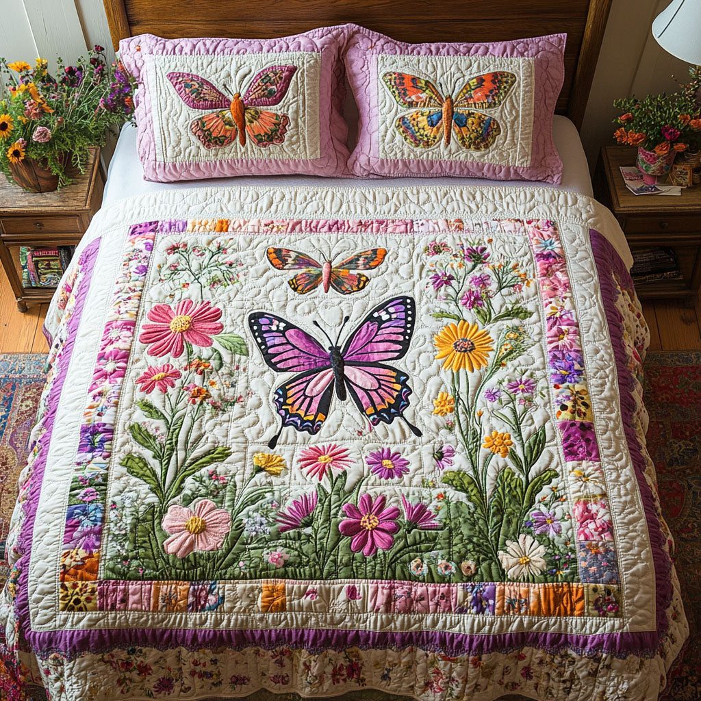 Butterfly Serenity quilted 3-piece bedding set on a made bed with two matching pillow shams