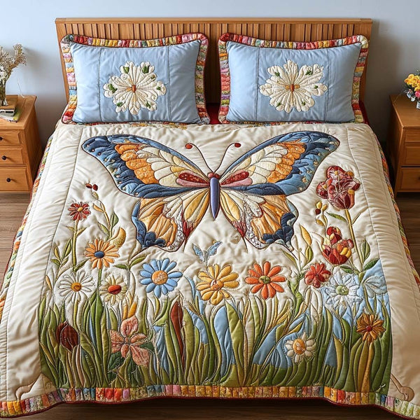 Butterfly Tales quilted 3-piece bedding set on a made bed with two matching pillow shams