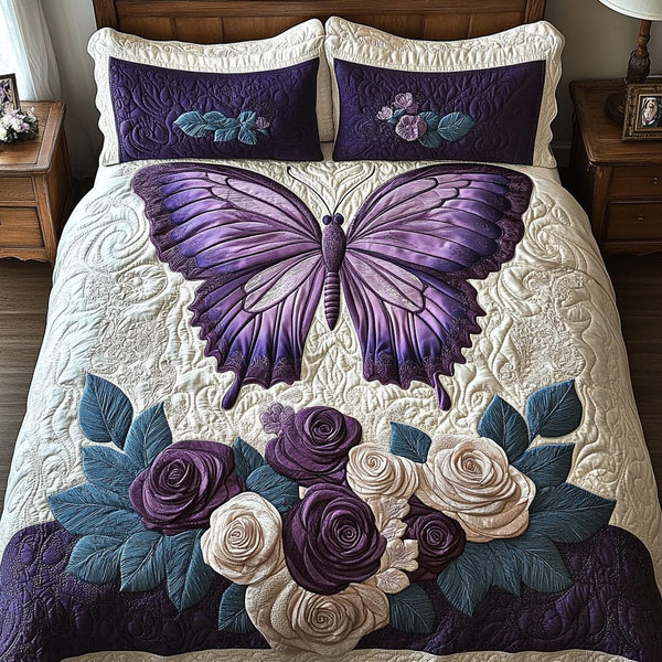 Butterfly Whisper quilted 3-piece bedding set on a made bed with two matching pillow shams