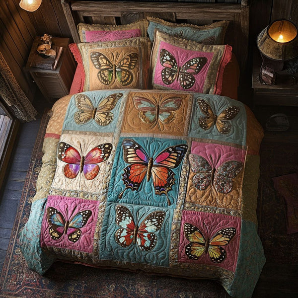 Butterfly Whispers quilted 3-piece bedding set on a made bed with two matching pillow shams
