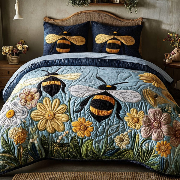 Buzz Bloom quilted 3-piece bedding set on a made bed with two matching pillow shams