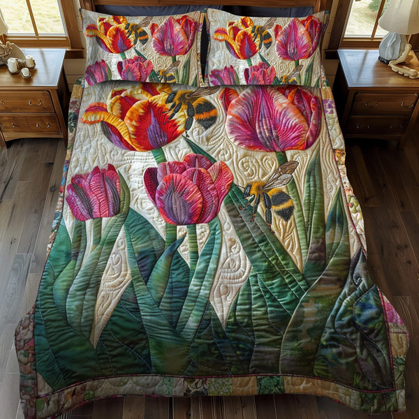 Buzzing Beauty Floral quilted 3-piece bedding set on a made bed with two matching pillow shams