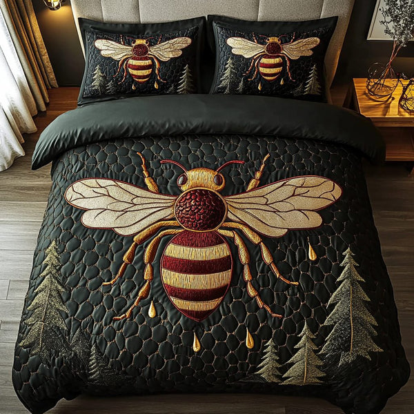 Buzzing Bliss quilted 3-piece bedding set on a made bed with two matching pillow shams