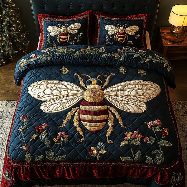 Buzzing Blossoms quilted 3-piece bedding set on a made bed with two matching pillow shams