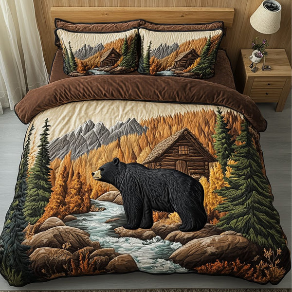 Cabin Dreams quilted 3-piece bedding set on a made bed with two matching pillow shams