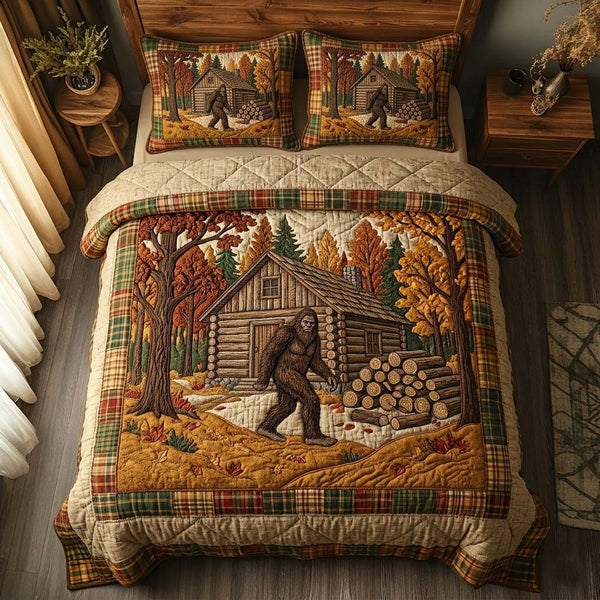 Cabin Path Bigfoot quilted 3-piece bedding set on a made bed with two matching pillow shams