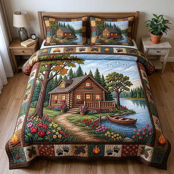 Cabin Retreat quilted 3-piece bedding set on a made bed with two matching pillow shams