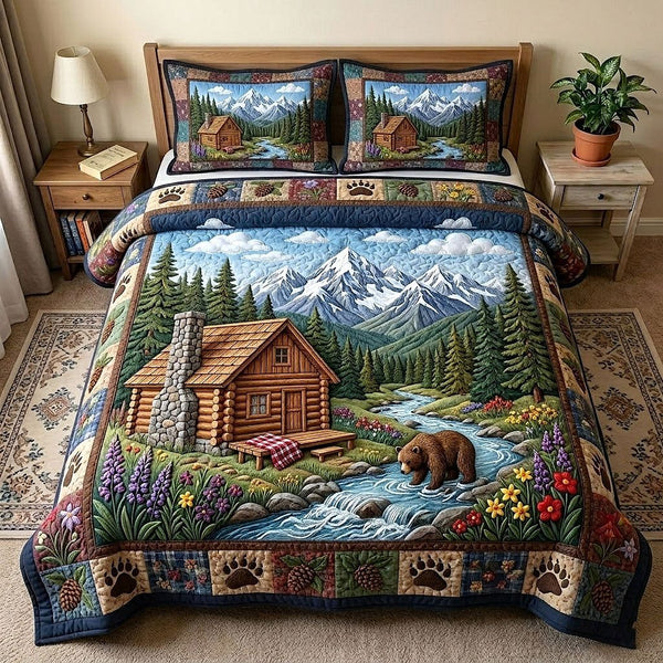 Cabin Retreat quilted 3-piece bedding set on a made bed with two matching pillow shams