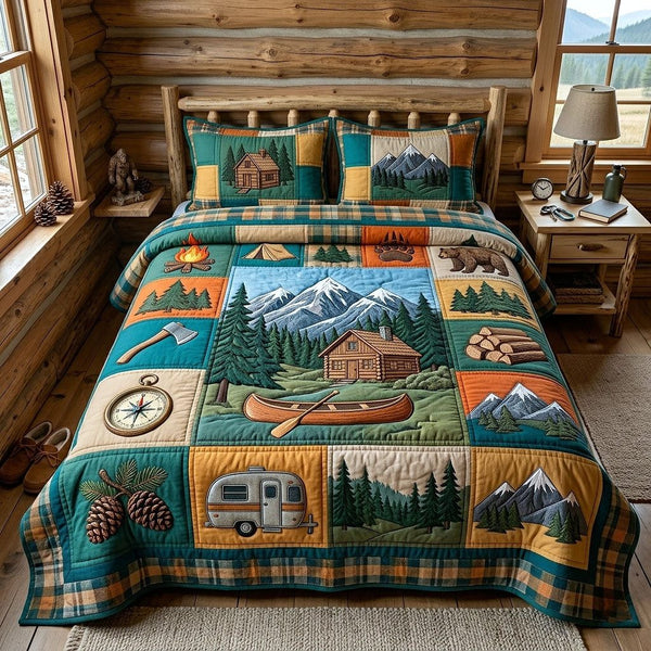 Cabin Retreat quilted 3-piece bedding set on a made bed with two matching pillow shams
