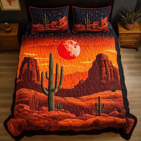 Cactus Dream quilted 3-piece bedding set on a made bed with two matching pillow shams