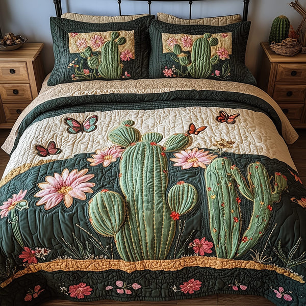 Cactus Dreamer quilted 3-piece bedding set on a made bed with two matching pillow shams
