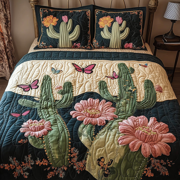 Cactus Dreamer quilted 3-piece bedding set on a made bed with two matching pillow shams