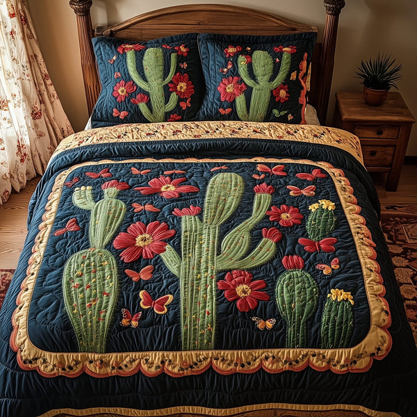 Cactus Dreamer quilted 3-piece bedding set on a made bed with two matching pillow shams