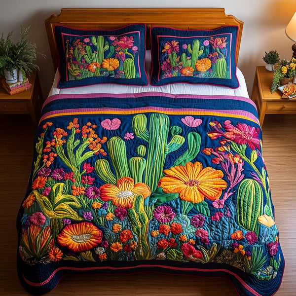 Cactus Garden quilted 3-piece bedding set on a made bed with two matching pillow shams