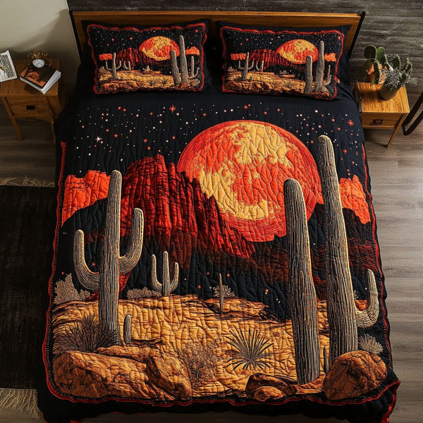 Cactus Glow quilted 3-piece bedding set on a made bed with two matching pillow shams
