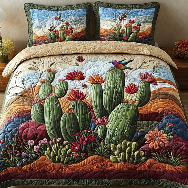 Cactus Haven quilted 3-piece bedding set on a made bed with two matching pillow shams
