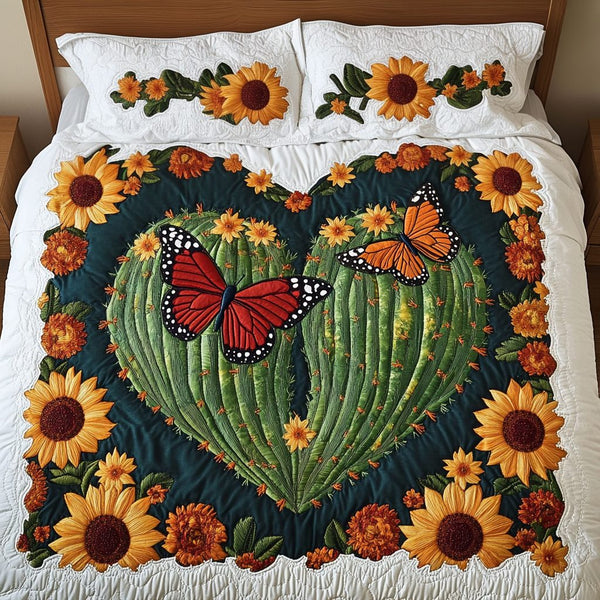 Cactus Heart quilted 3-piece bedding set on a made bed with two matching pillow shams