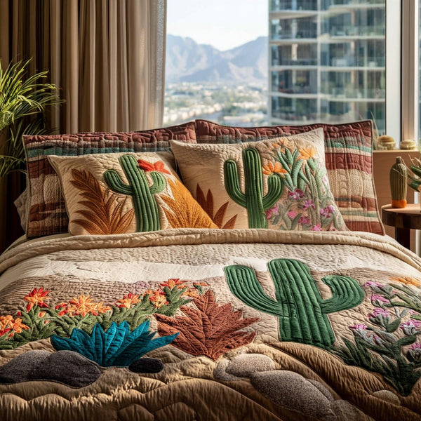 Cactus Oasis quilted 3-piece bedding set on a made bed with two matching pillow shams