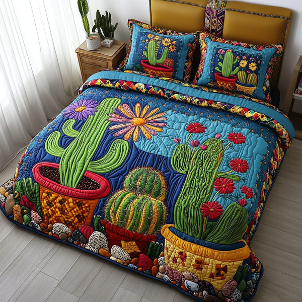 Cactus Parade quilted 3-piece bedding set on a made bed with two matching pillow shams