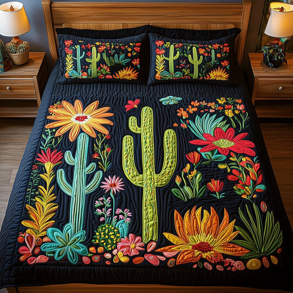 Cactus Paradise quilted 3-piece bedding set on a made bed with two matching pillow shams