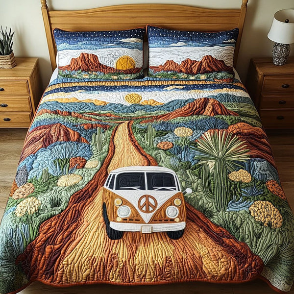 Cactus Pathway quilted 3-piece bedding set on a made bed with two matching pillow shams