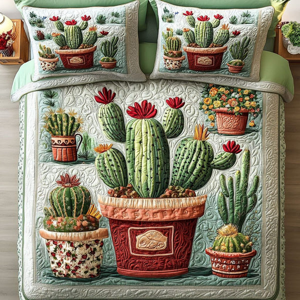 Cactus Pot Garden quilted 3-piece bedding set on a made bed with two matching pillow shams