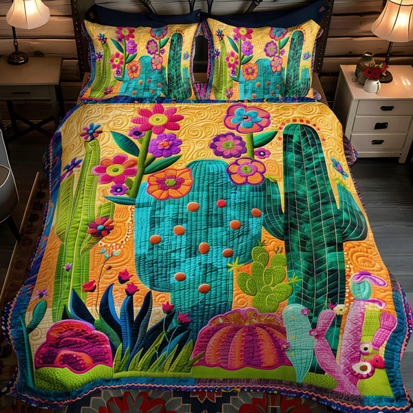 Cactus Sunrise Symphony quilted 3-piece bedding set on a made bed with two matching pillow shams