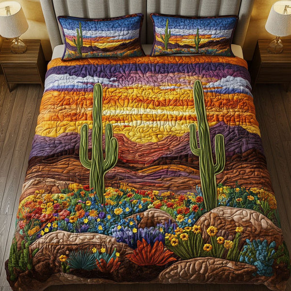 Cactus Sunrise View quilted 3-piece bedding set on a made bed with two matching pillow shams