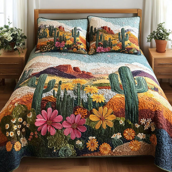 Cactus Sunset quilted 3-piece bedding set on a made bed with two matching pillow shams
