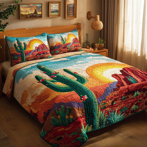 Cactus Sunset quilted 3-piece bedding set on a made bed with two matching pillow shams