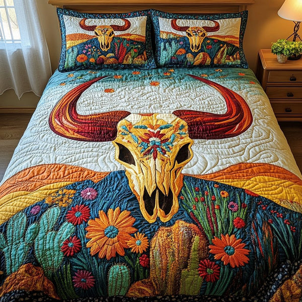 Cactus Sunset quilted 3-piece bedding set on a made bed with two matching pillow shams