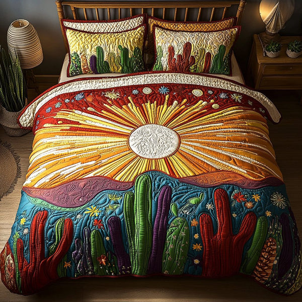 Cactus Sunset quilted 3-piece bedding set on a made bed with two matching pillow shams