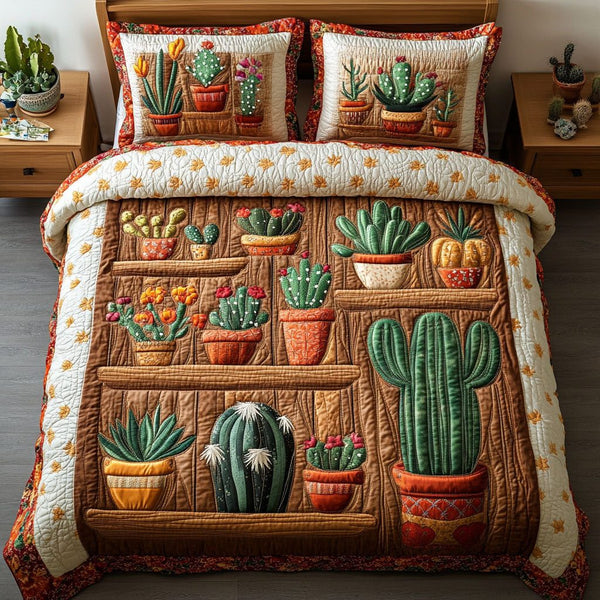 Cactus Variety Pattern quilted 3-piece bedding set on a made bed with two matching pillow shams
