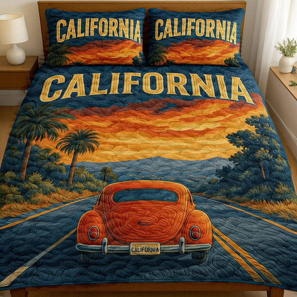 California Dreamin quilted 3-piece bedding set on a made bed with two matching pillow shams