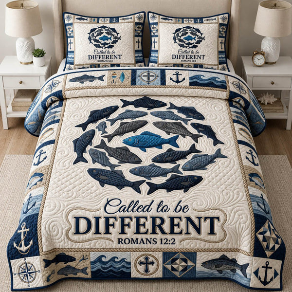 Called To Be Different quilted 3-piece bedding set on a made bed with two matching pillow shams