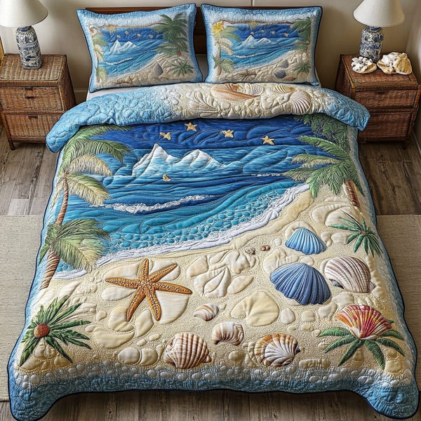 Calm Coast quilted 3-piece bedding set on a made bed with two matching pillow shams