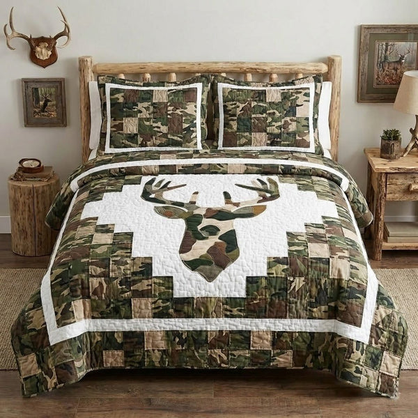 Camo Trophy Buck quilted 3-piece bedding set on a made bed with two matching pillow shams