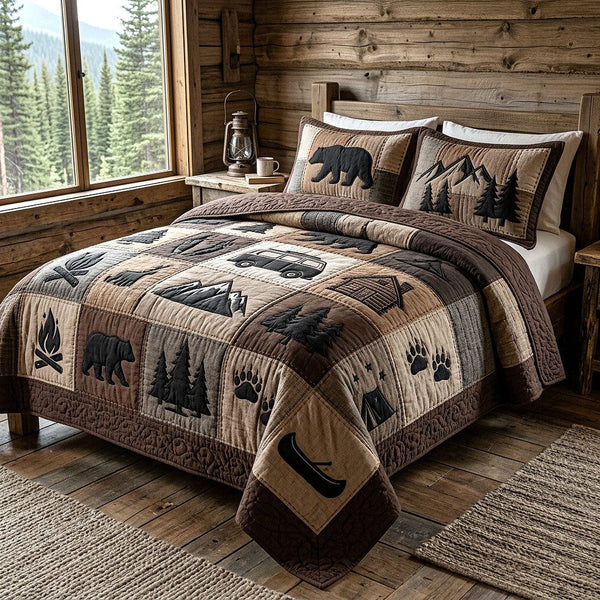 Camp Escape quilted 3-piece bedding set on a made bed with two matching pillow shams