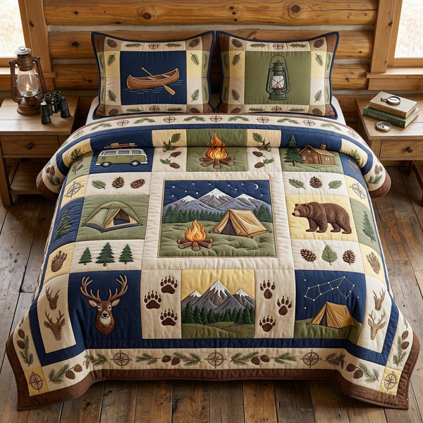 Camp Escape quilted 3-piece bedding set on a made bed with two matching pillow shams