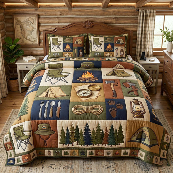 Camp Escape quilted 3-piece bedding set on a made bed with two matching pillow shams