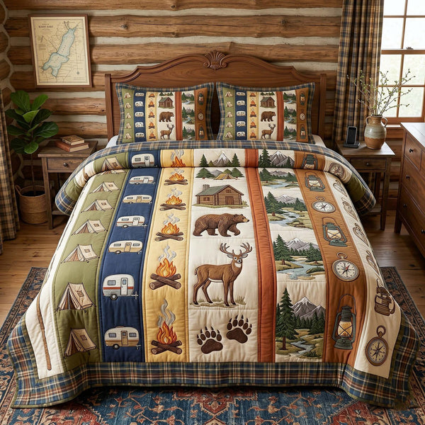 Camp Escape quilted 3-piece bedding set on a made bed with two matching pillow shams