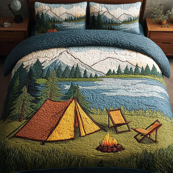 Camp Escape quilted 3-piece bedding set on a made bed with two matching pillow shams