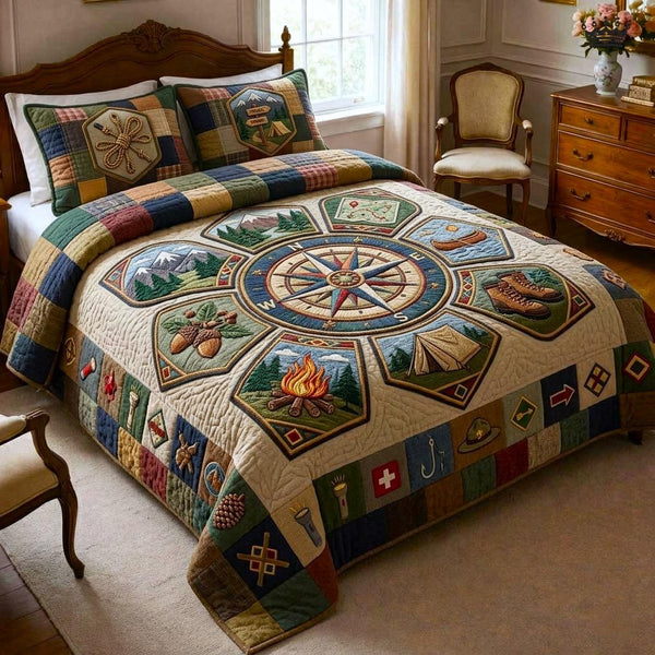 Camp Explorer quilted 3-piece bedding set on a made bed with two matching pillow shams