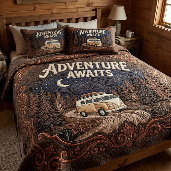 Camp Retreat quilted 3-piece bedding set on a made bed with two matching pillow shams