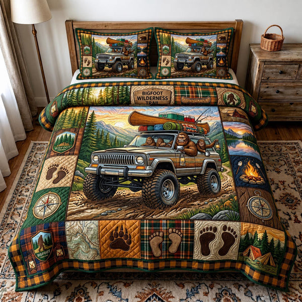 Camp Roamer quilted 3-piece bedding set on a made bed with two matching pillow shams