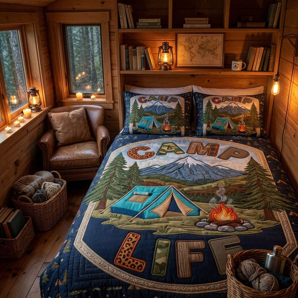 Camp Vibes quilted 3-piece bedding set on a made bed with two matching pillow shams