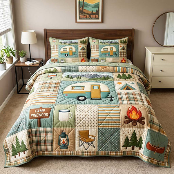 Camper Camp quilted 3-piece bedding set on a made bed with two matching pillow shams