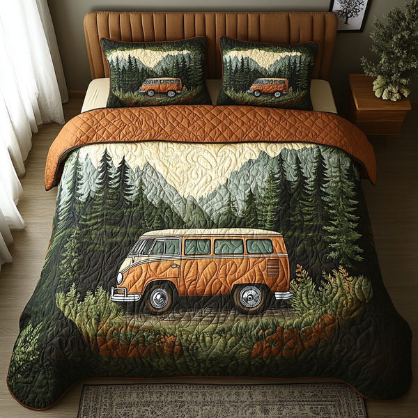 Camper Dreams quilted 3-piece bedding set on a made bed with two matching pillow shams