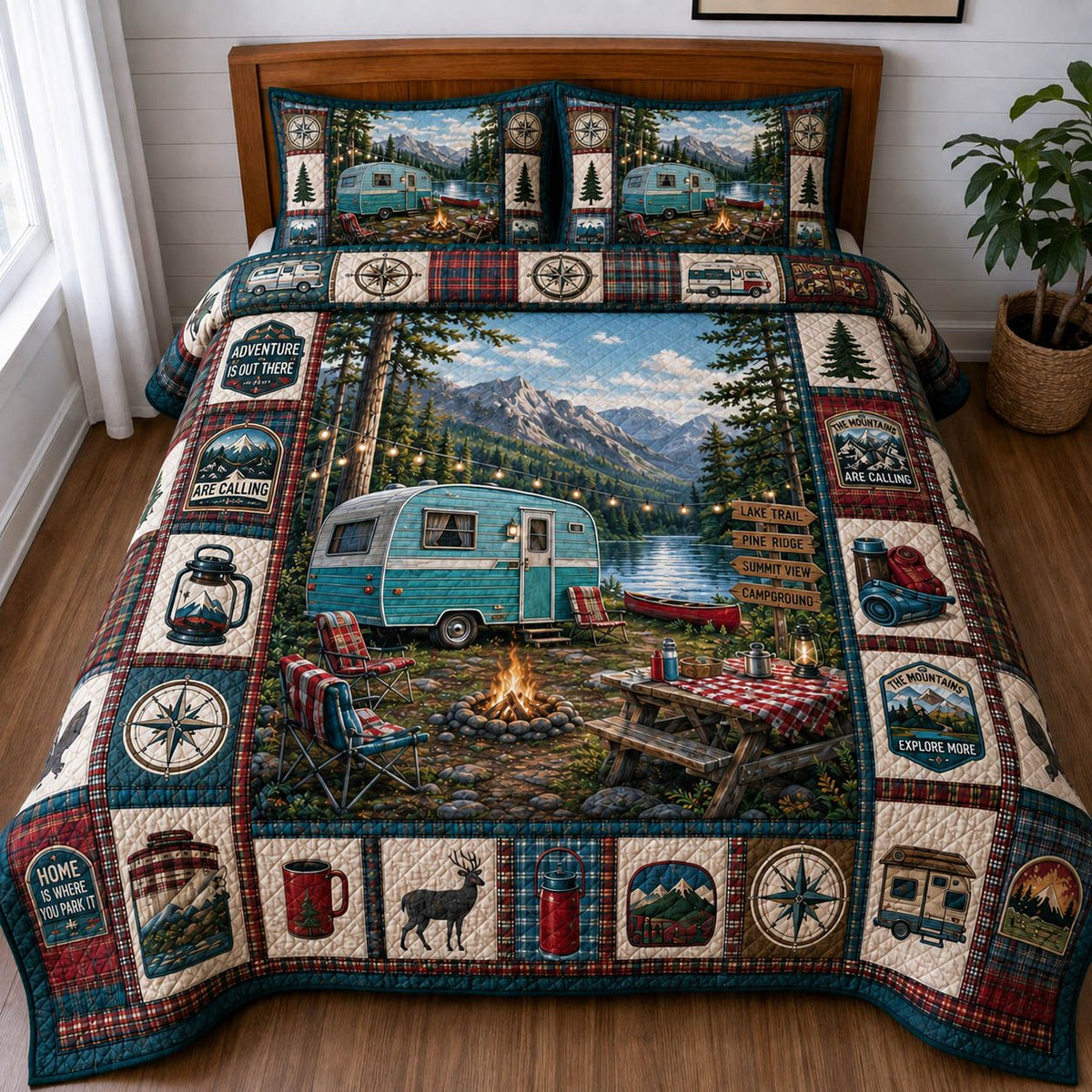 Camper Retreat quilted 3-piece bedding set on a made bed with two matching pillow shams